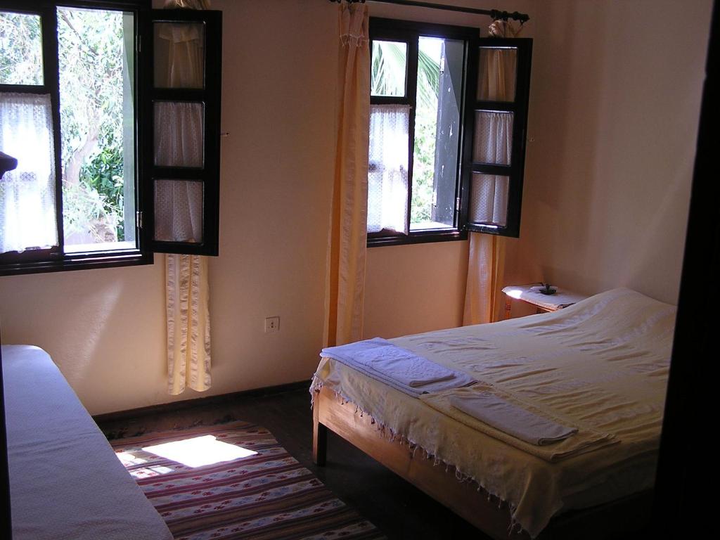 Postel nebo postele na pokoji v ubytování Kalkan Turk Evi