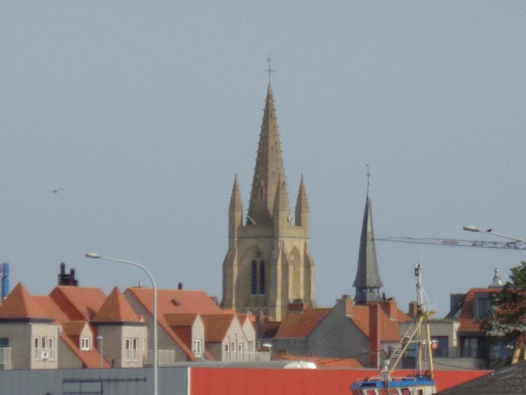Nespecifikovaný výhled na destinaci Nieuwpoort nebo výhled na město při pohledu z penzionu