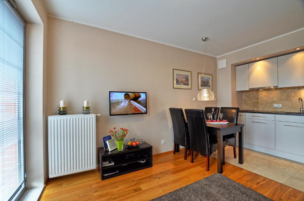 Kuchyňa alebo kuchynka v ubytovaní Tartaczna Deluxe Apartments Gdansk