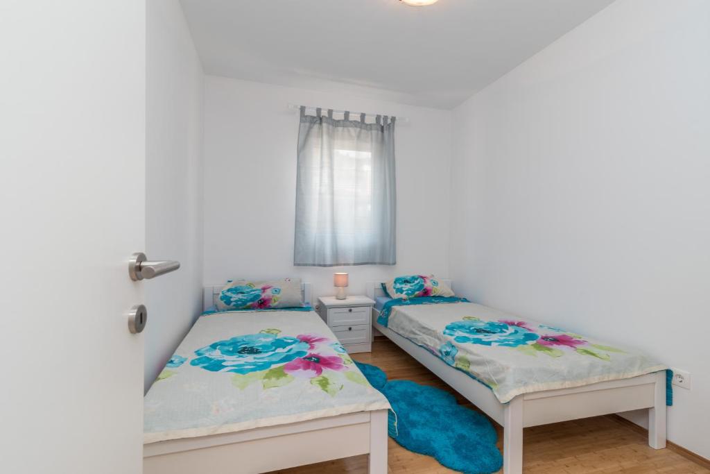 Posteľ alebo postele v izbe v ubytovaní "Blue"