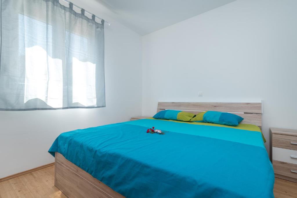 Posteľ alebo postele v izbe v ubytovaní "Blue"