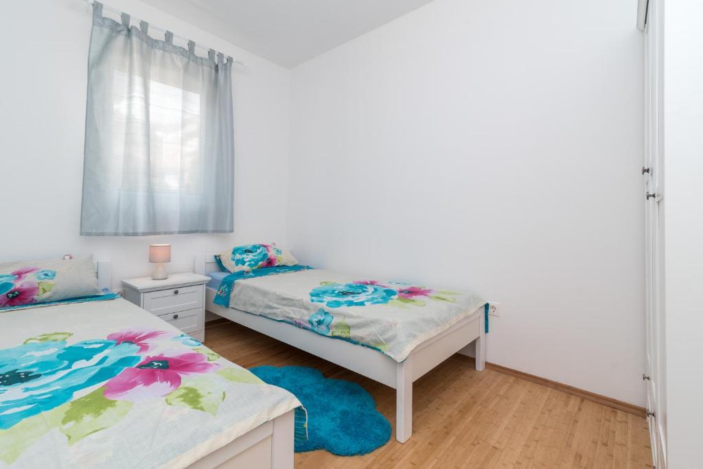 Posteľ alebo postele v izbe v ubytovaní "Blue"