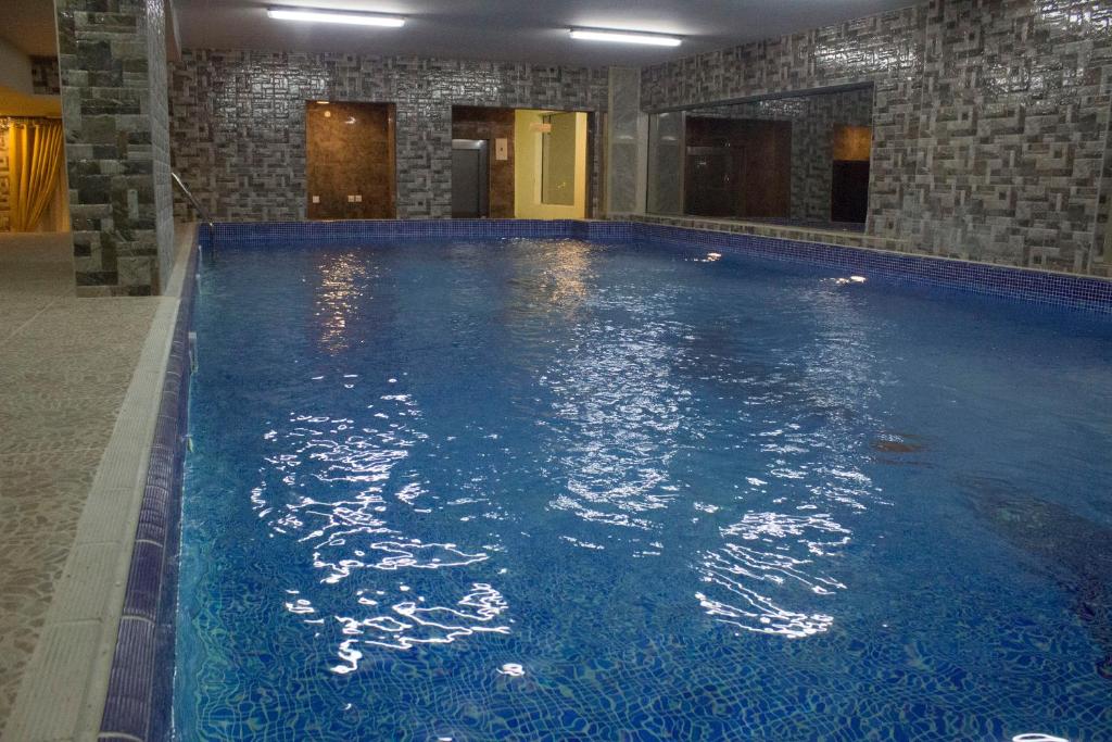 المسبح في Muscat Horizon Hotel أو بالجوار
