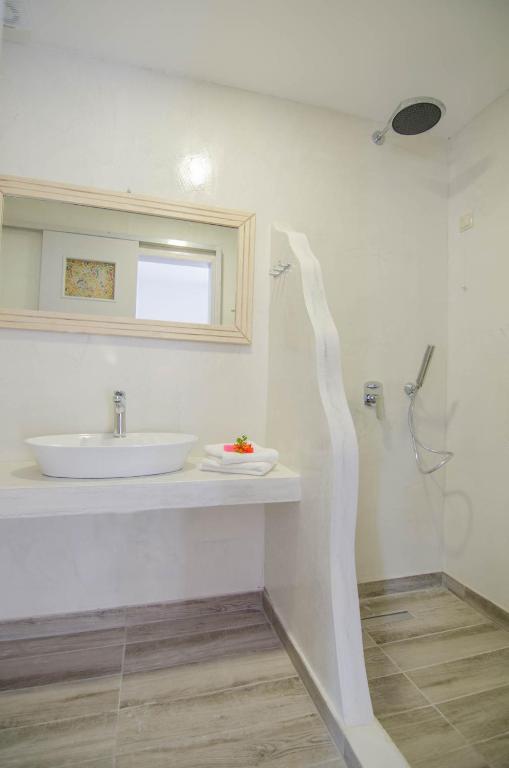 Koupelna v ubytování Hotel Delfini