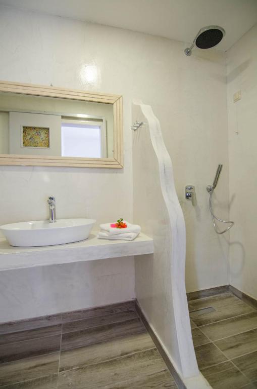Koupelna v ubytování Hotel Delfini