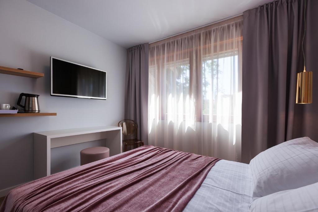 Postel nebo postele na pokoji v ubytování Rooms Albachiara