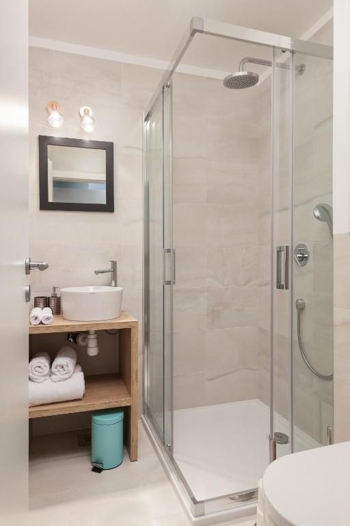 Koupelna v ubytování Rooms Albachiara