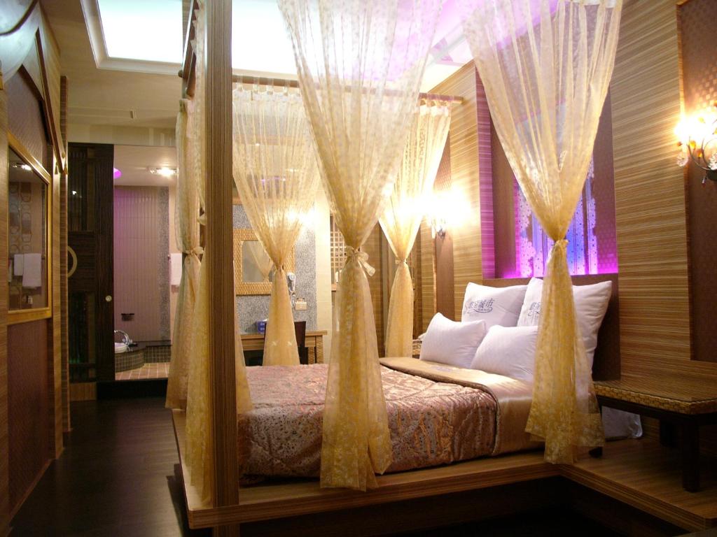 Postel nebo postele na pokoji v ubytování Sexy City Motel