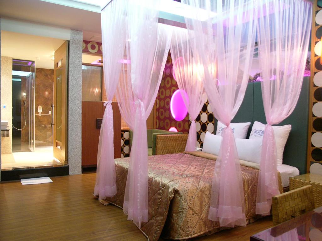 Postel nebo postele na pokoji v ubytování Sexy City Motel