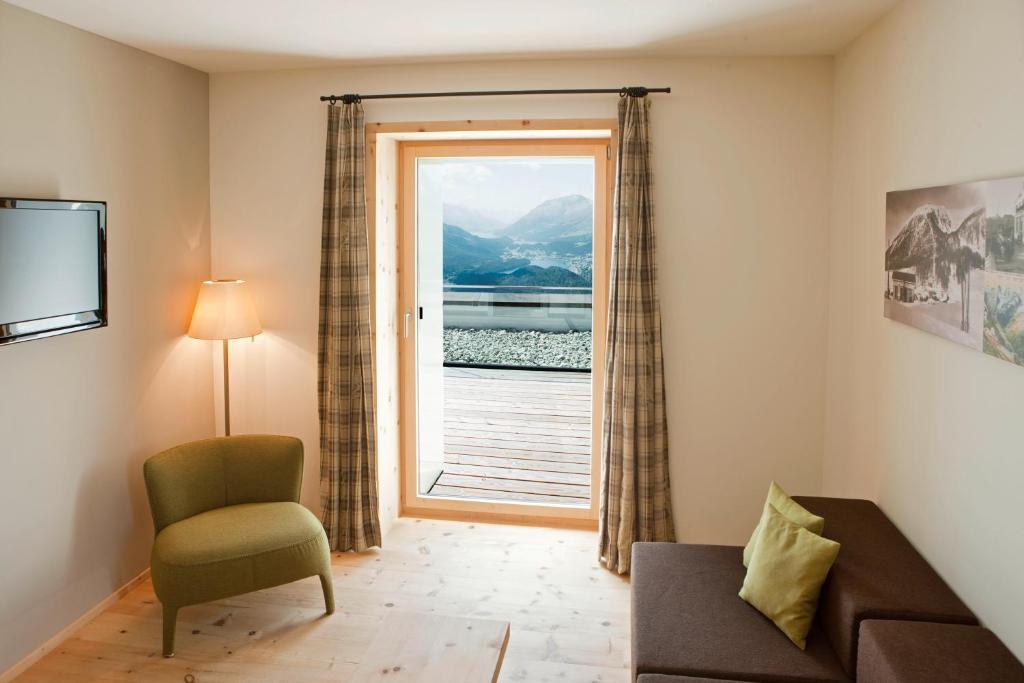 Posezení v ubytování Romantik Hotel Muottas Muragl