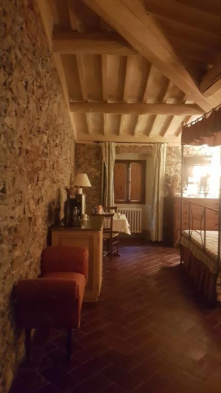 Łóżko lub łóżka w pokoju w obiekcie Locanda Di Alberi