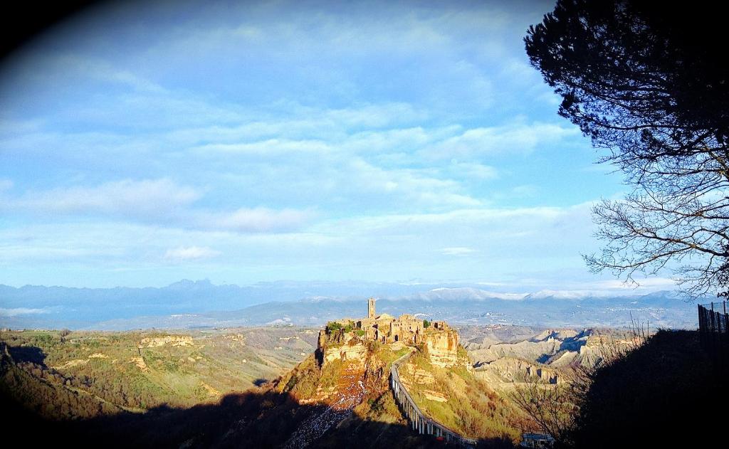 a mountain with a cross on top of it at francalancia52 in Bagnoregio