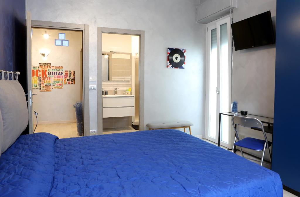 Postel nebo postele na pokoji v ubytování B&B SanRock