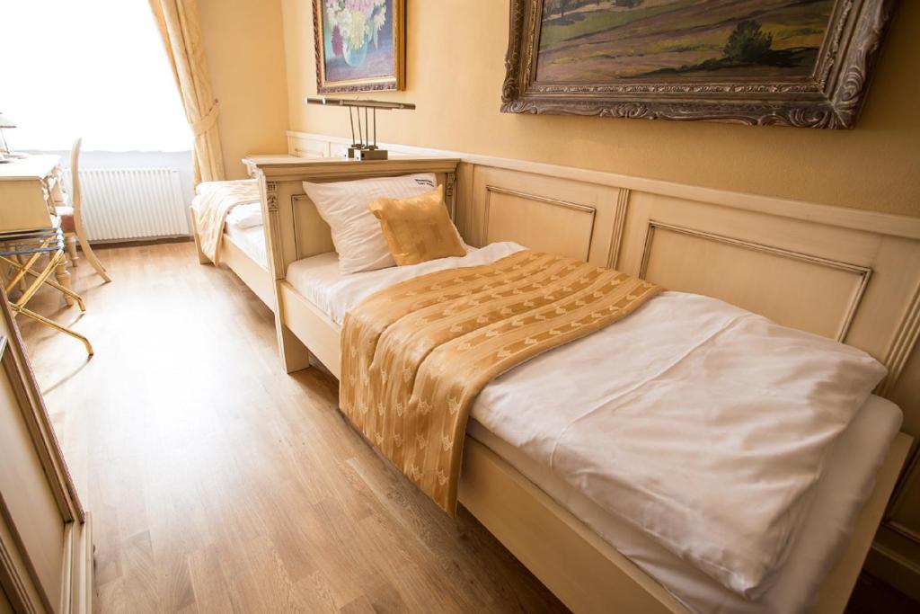 Postel nebo postele na pokoji v ubytování Pension PREMIUM