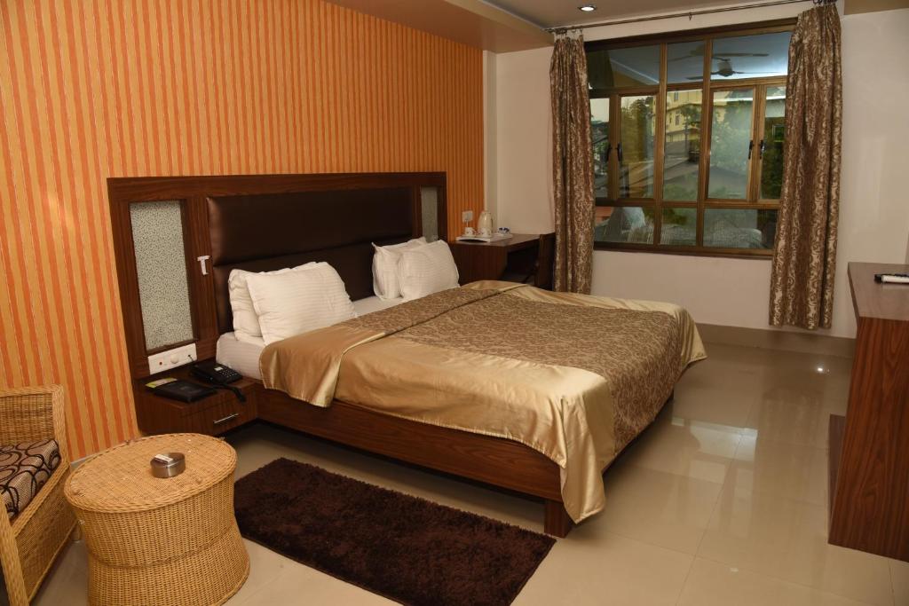 A bed or beds in a room at Hotel Pybss