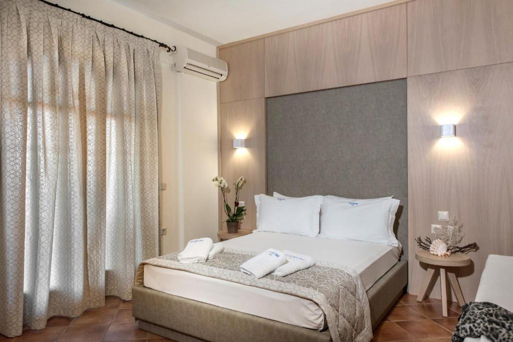 Postel nebo postele na pokoji v ubytování Archontiko