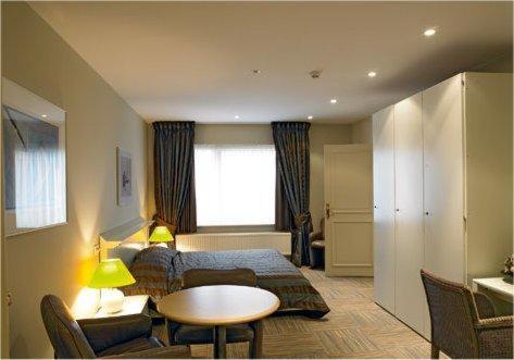Posezení v ubytování Hotel Salons De Vrede