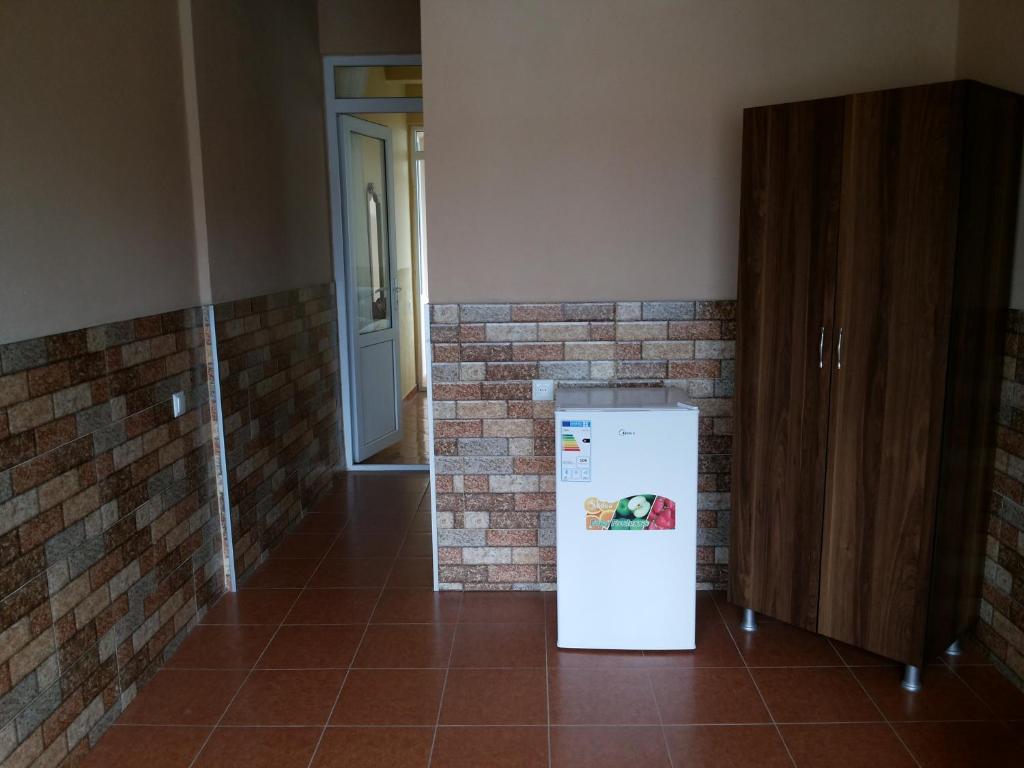 Kuchyň nebo kuchyňský kout v ubytování Kvariati Grand Guest House