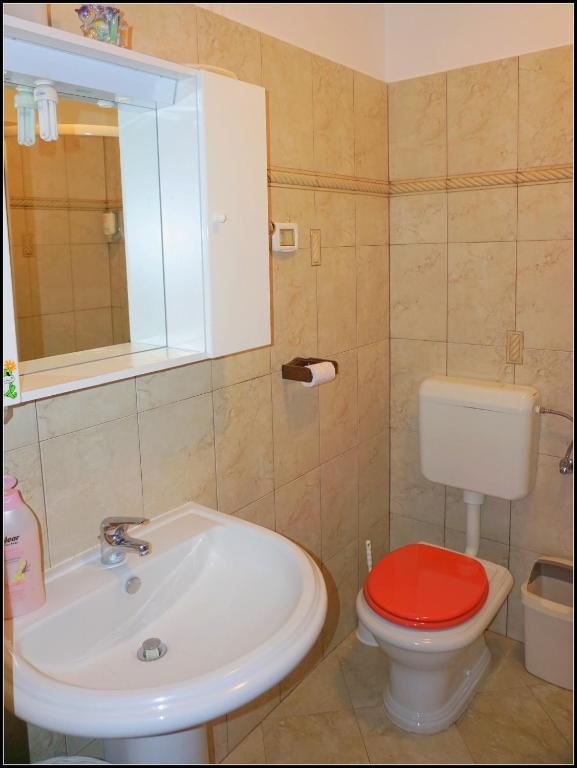 Koupelna v ubytování Apartments Nives NB