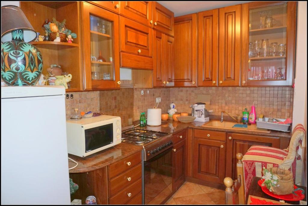 Kuchyň nebo kuchyňský kout v ubytování Apartments Nives NB
