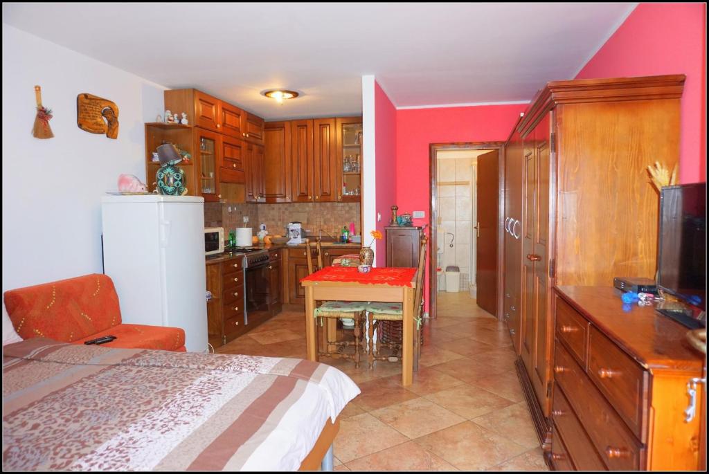 Kuchyň nebo kuchyňský kout v ubytování Apartments Nives NB