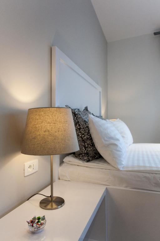 Posteľ alebo postele v izbe v ubytovaní Priuli Luxury Rooms