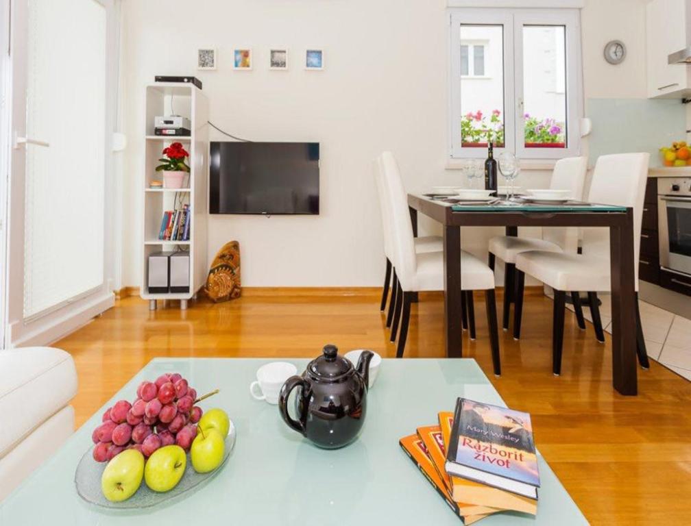 TV a/nebo společenská místnost v ubytování La Vita e Bella Apartment