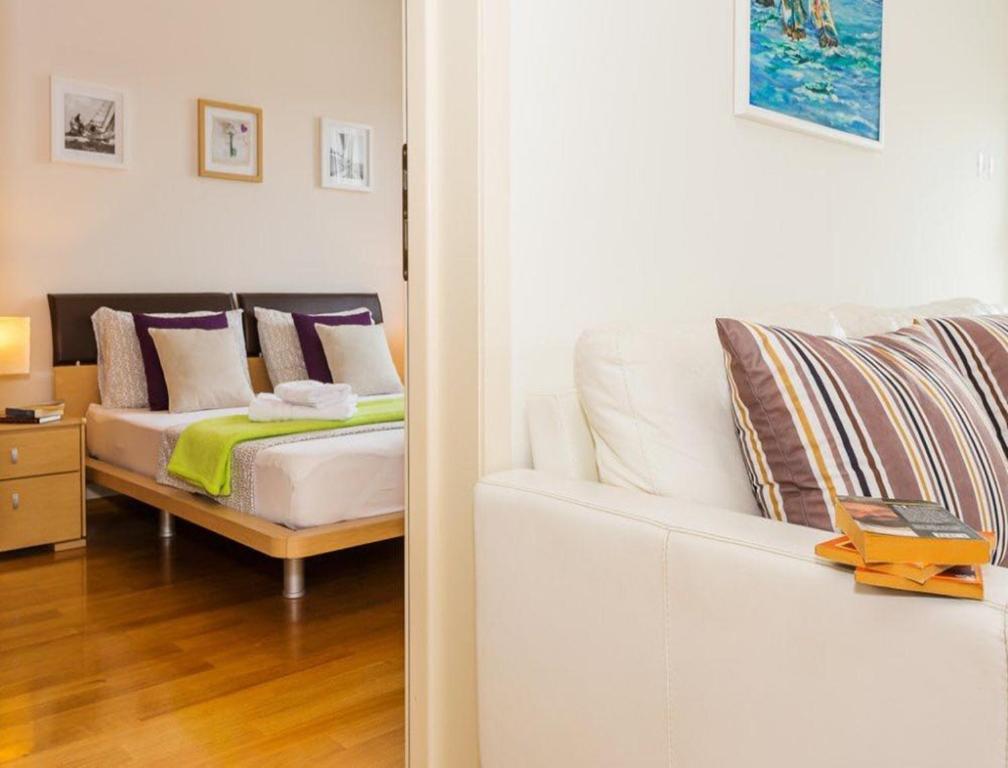 Postel nebo postele na pokoji v ubytování La Vita e Bella Apartment