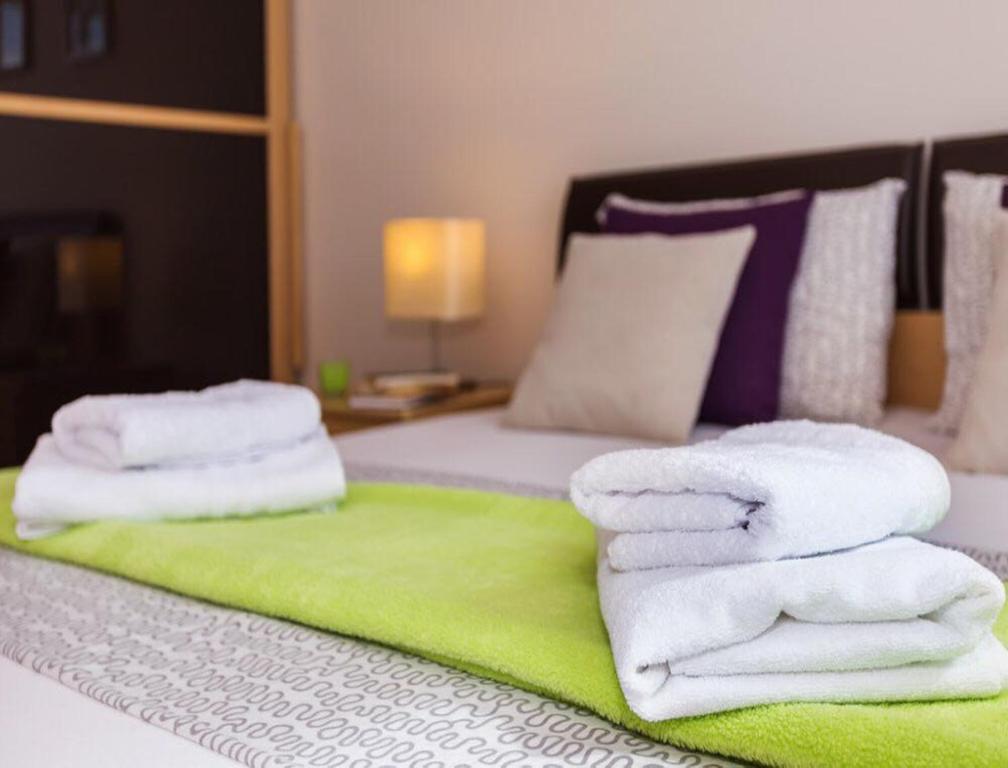 Postel nebo postele na pokoji v ubytování La Vita e Bella Apartment