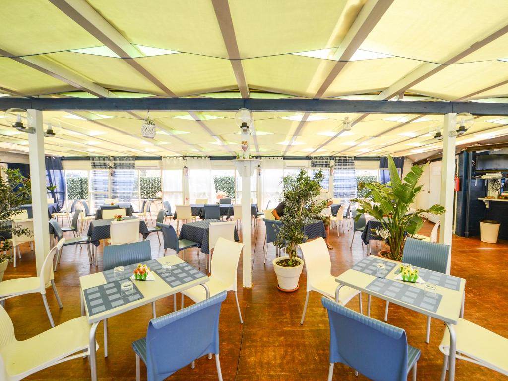 Restauracja lub miejsce do jedzenia w obiekcie Gelso Bianco Apartments