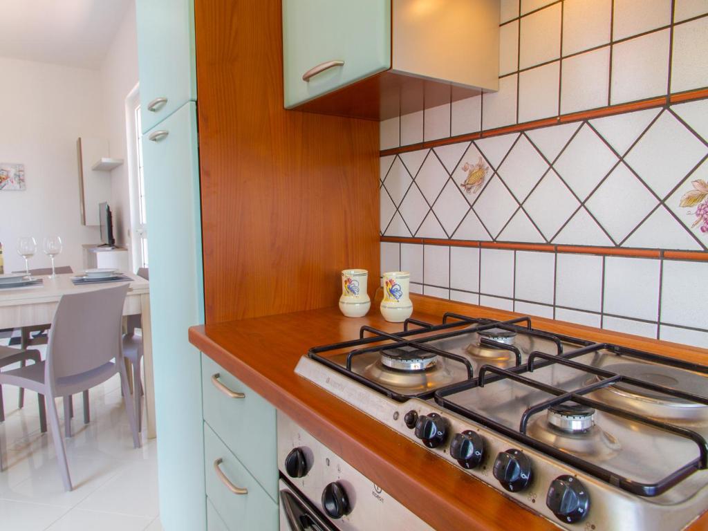 Kuchnia lub aneks kuchenny w obiekcie Gelso Bianco Apartments