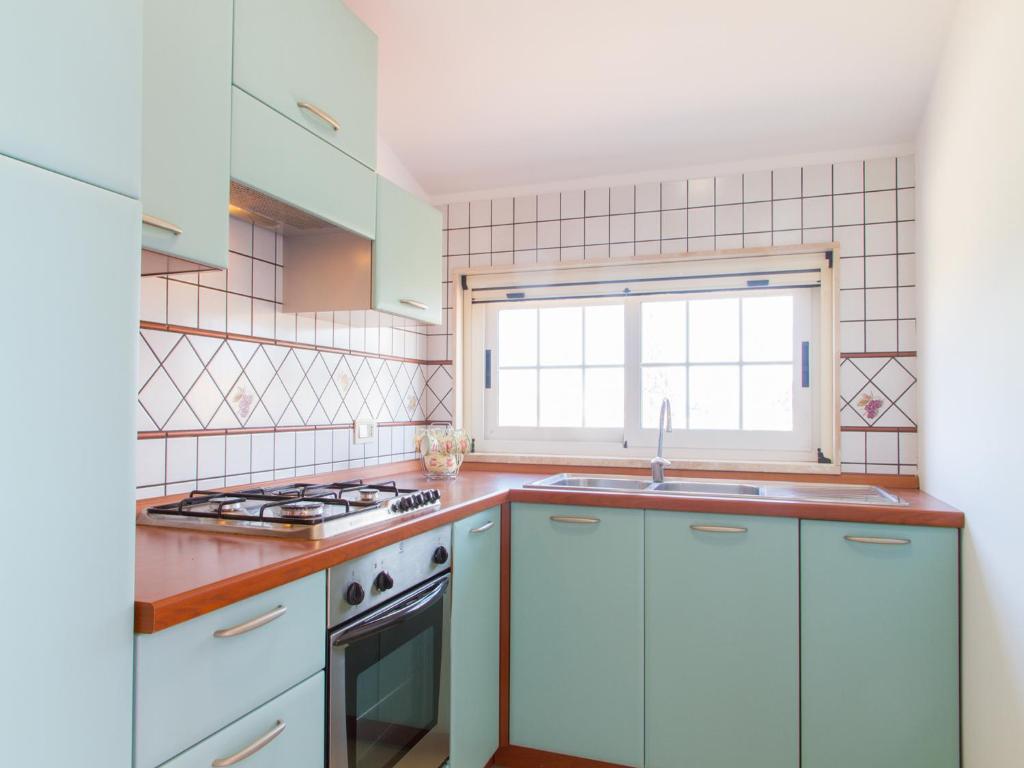 Kuchnia lub aneks kuchenny w obiekcie Gelso Bianco Apartments