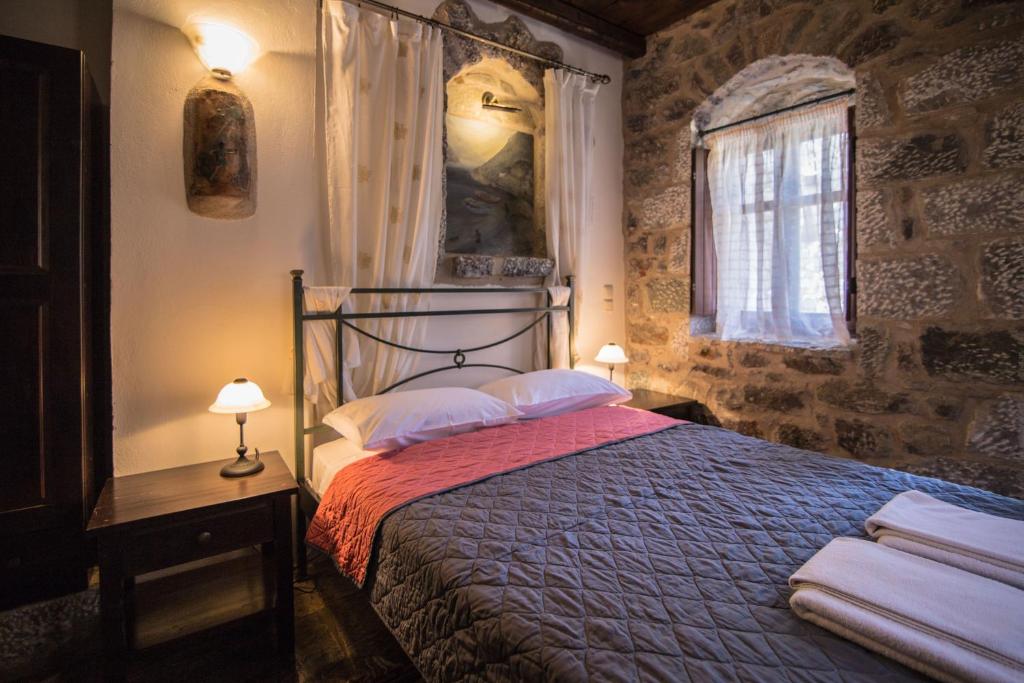 Postel nebo postele na pokoji v ubytování Psamathous Guesthouse