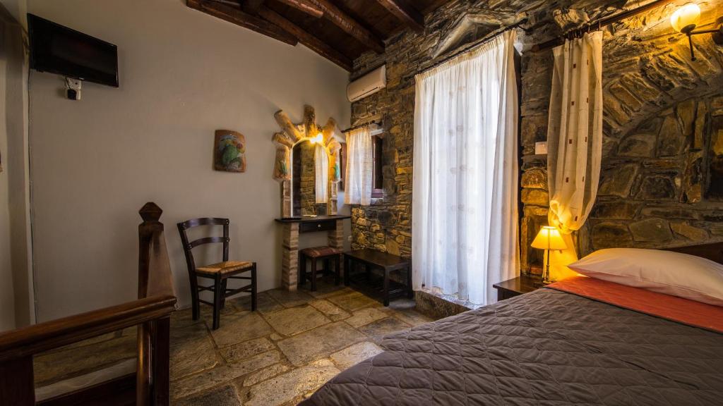 Postel nebo postele na pokoji v ubytování Psamathous Guesthouse
