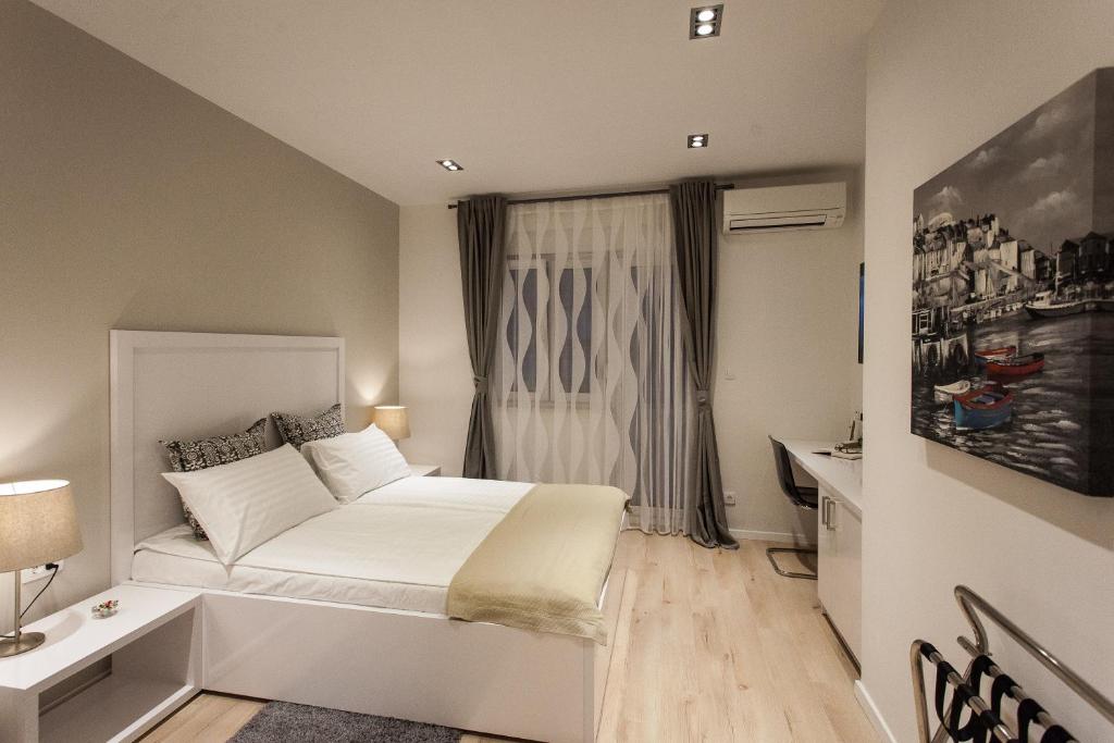 Posteľ alebo postele v izbe v ubytovaní Priuli Luxury Rooms