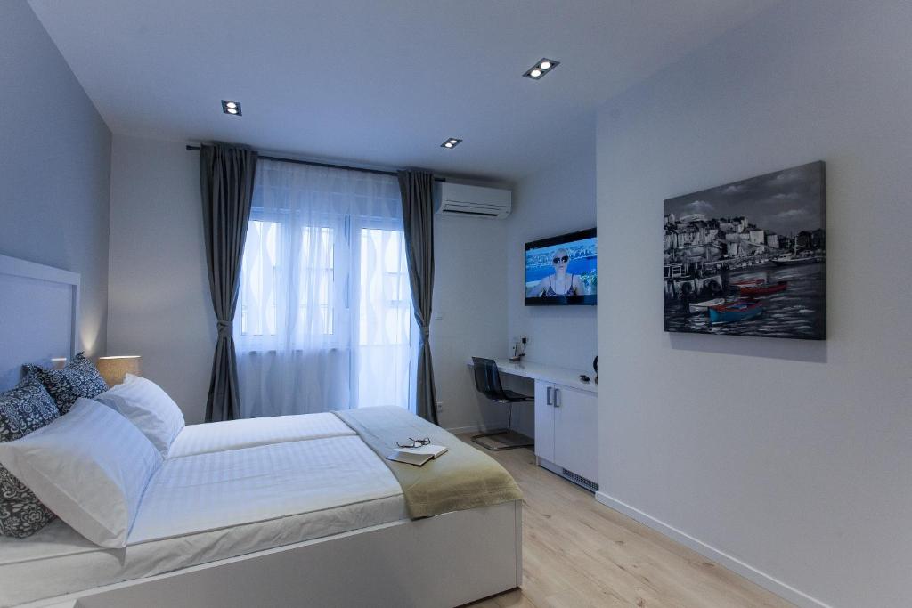 Posteľ alebo postele v izbe v ubytovaní Priuli Luxury Rooms