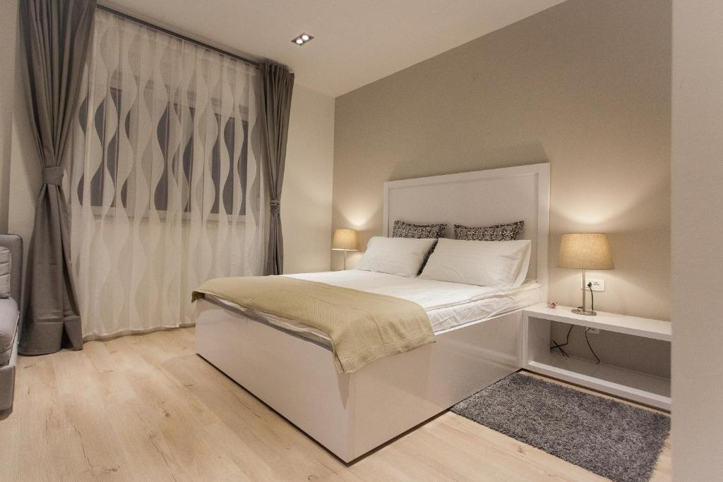Posteľ alebo postele v izbe v ubytovaní Priuli Luxury Rooms