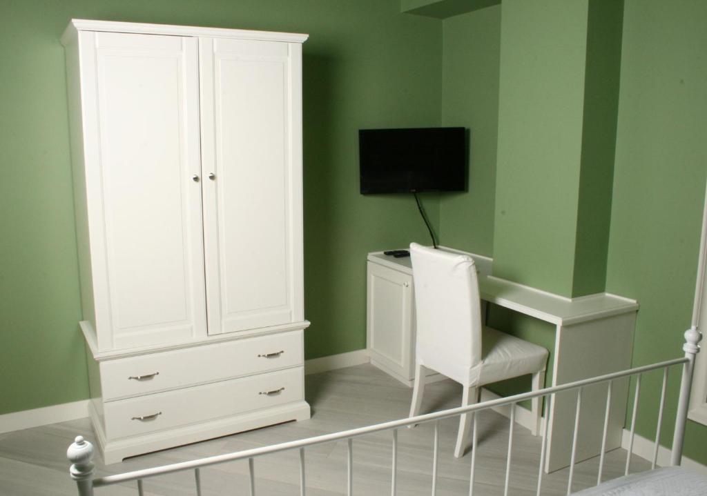 Telewizja i/lub zestaw kina domowego w obiekcie Residenza Cavour