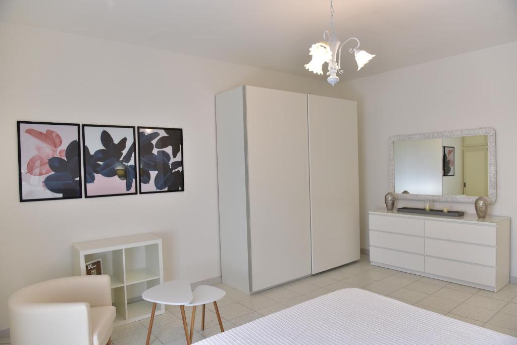 Posteľ alebo postele v izbe v ubytovaní Villa Elisabetta Apartments