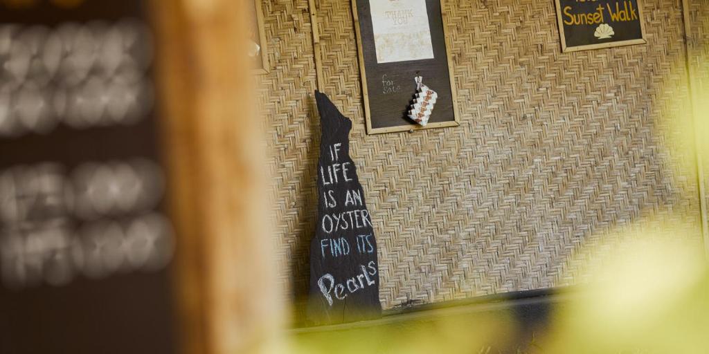 Certificato, attestato, insegna o altro documento esposto da Pearl Beach Resort Gili Asahan