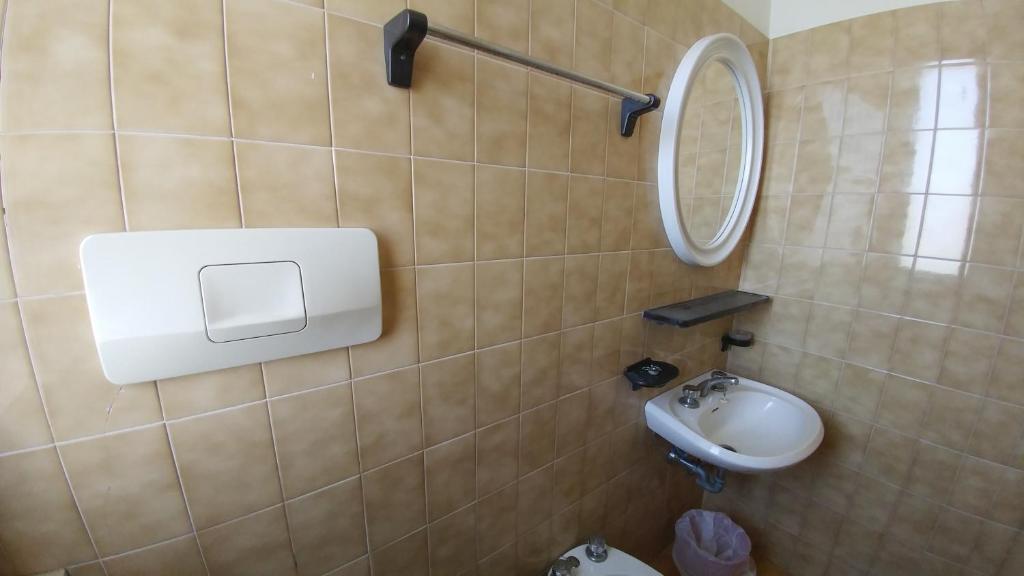 Koupelna v ubytování Hotel Capitol