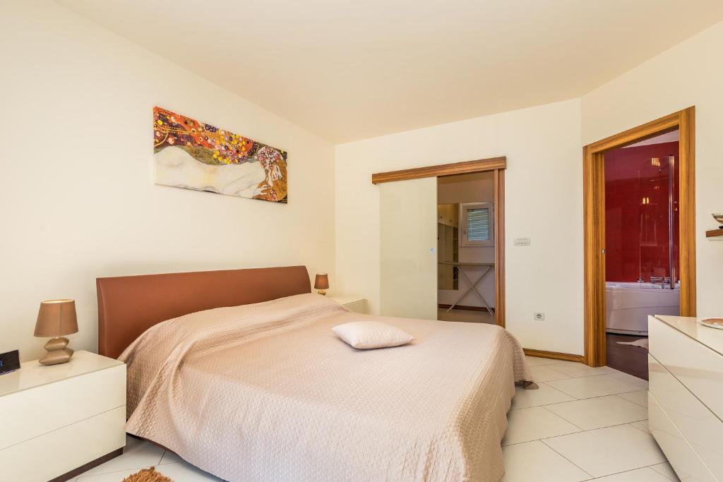 Posteľ alebo postele v izbe v ubytovaní Luxury penthouse Prestige near the sea