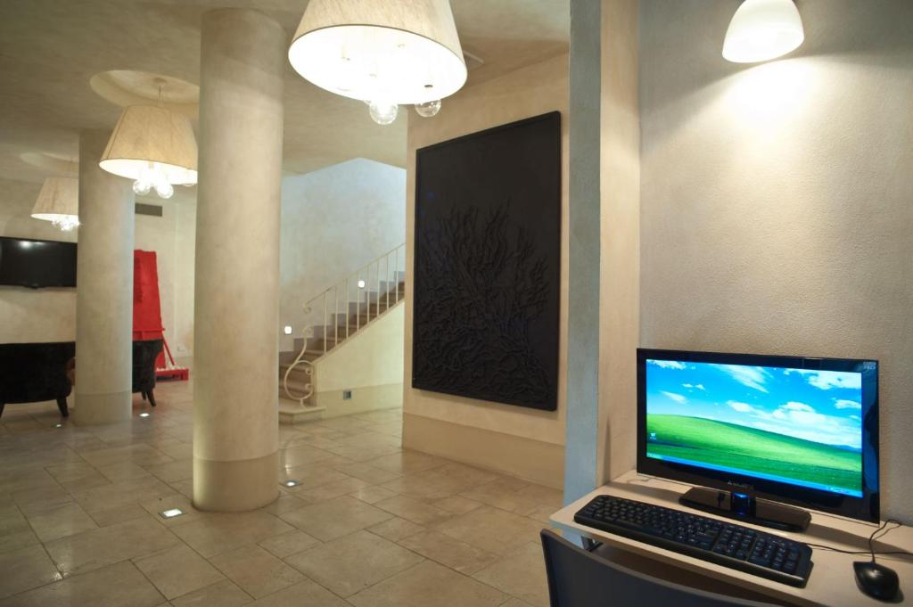TV a/nebo společenská místnost v ubytování Hotel Residence Stella del Mare