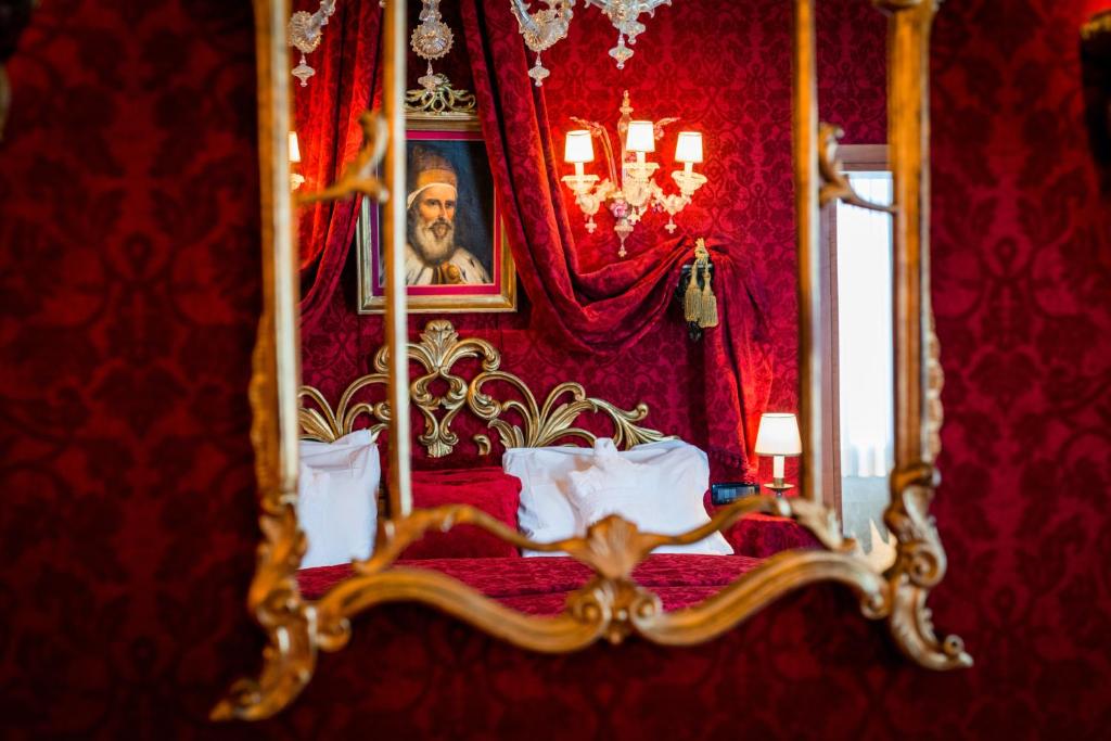 Postel nebo postele na pokoji v ubytování Ca Maria Adele