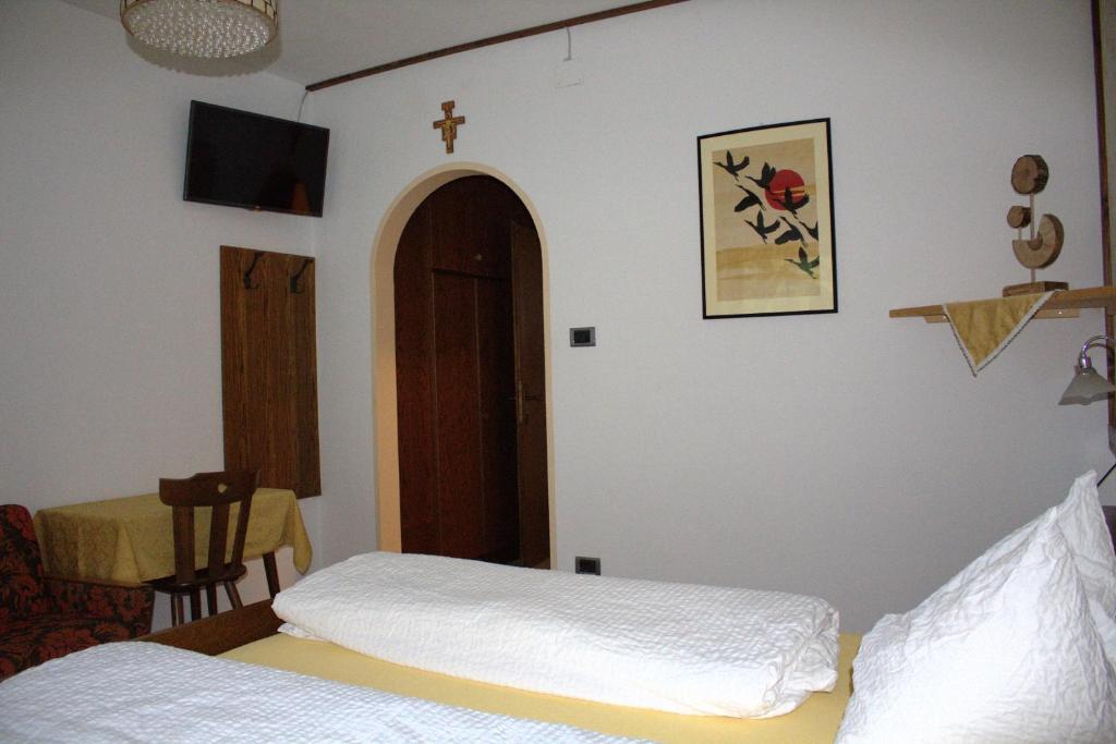Postel nebo postele na pokoji v ubytování Hotel Bad Bergfall