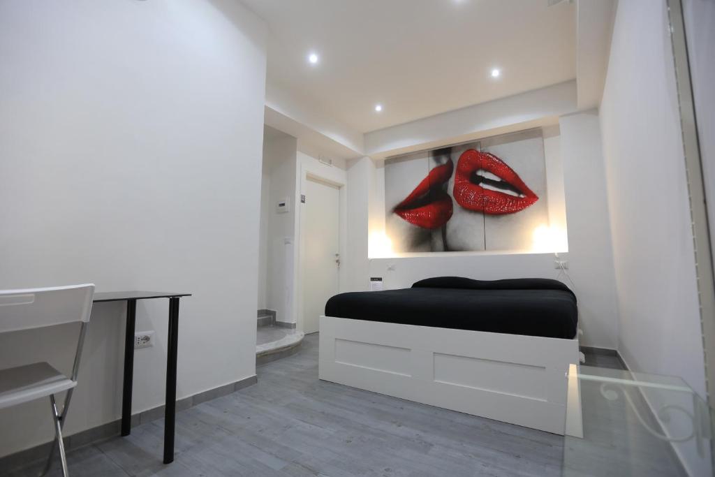 A bed or beds in a room at Cico B&B