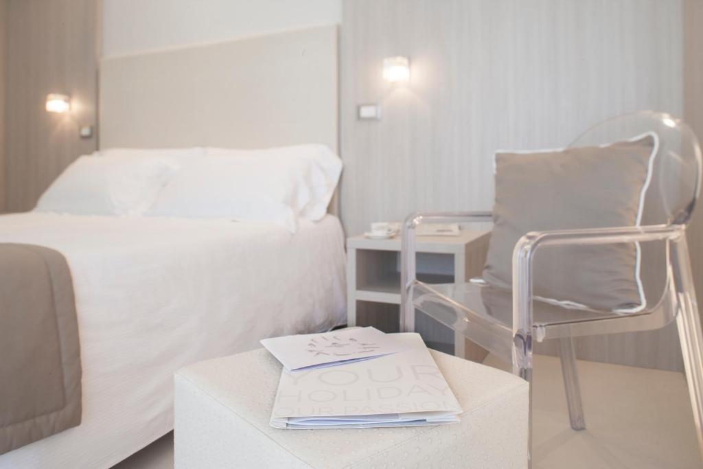 Postel nebo postele na pokoji v ubytování Hotel Delle Nazioni