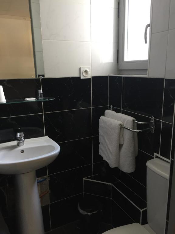 Koupelna v ubytování Hotel Relais Sud
