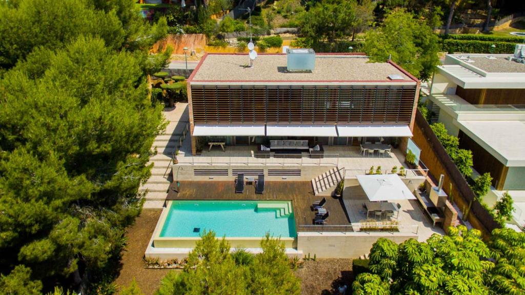 an overhead view of a building with a swimming pool at Villa Foixarda near Barcelona, TarracoHomes in Tamarit