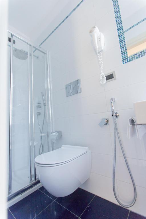 Koupelna v ubytování Hotel Piacenza
